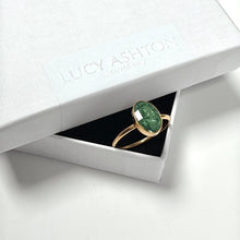 Load image into Gallery viewer, Lucy Ashton Jewellery gold oval ring on plain band cremation ashes set in dark green pearl