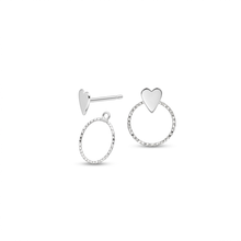 Load image into Gallery viewer, A pair of silver heart stud earrings on a plain white background, one showing a polished heart-shaped stud with a post, and the other showing a textured circular hoop with a small heart at the top.