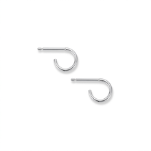 Load image into Gallery viewer, A pair of silver-toned huggie hoop earrings with straight posts, shown on a plain white background.