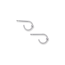 Load image into Gallery viewer, A pair of silver-toned twisted hoop earrings with straight posts and small bead details, shown on a plain white background.