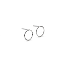 Load image into Gallery viewer, A pair of silver-toned open hoop earrings with a textured, twisted outer edge, shown on a clean white background.
