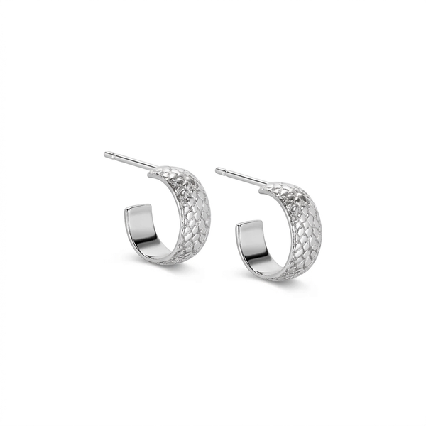 A pair of silver hoop earrings with a textured, woven or scale-like pattern on the outer curve, shown on a plain white background.